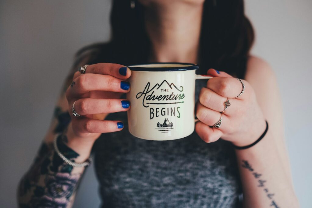 Photo by Annie Spratt woman holding mug