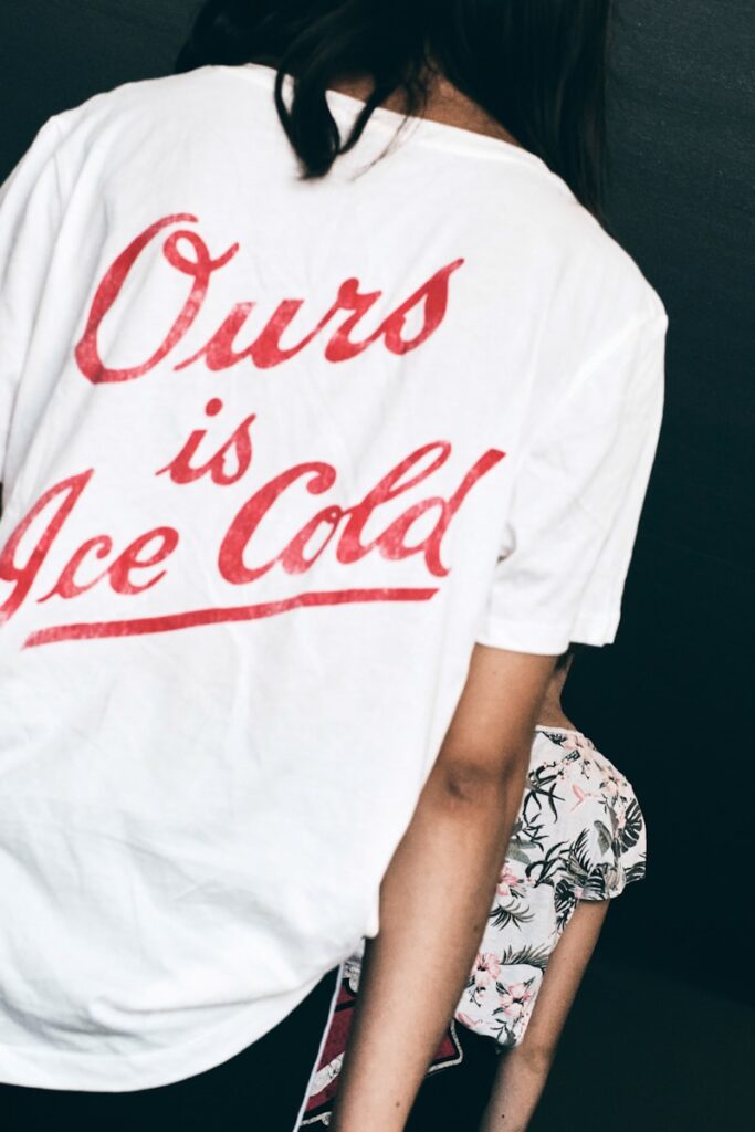 Photo by Marcus Ganahl white and red crew neck t-shirt